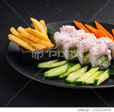 sushi rolls with crab sticks and cucumbers 112121450