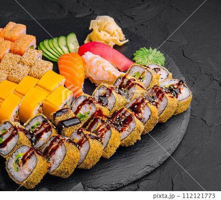 Sushi set on black stone background 112121773