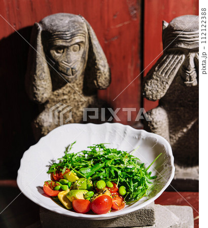 Fresh salad with avocado, cherry tomatoes and arugula Fresh salad with avocado, cherry tomatoes and arugula 112122388