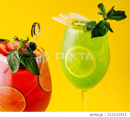 Cocktails with fresh strawberries, kiwi and lemons Cocktails with fresh strawberries, kiwi and lemons 112122413