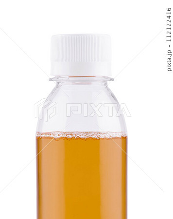 small plastic bottle with apple juice on a white small plastic bottle with apple juice on a white 112122416