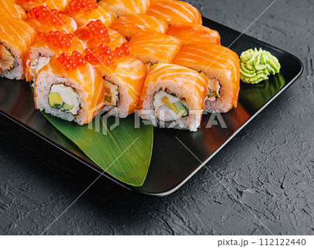 Philadelphia roll sushi with salmon, prawn, avocado, cream cheese 112122440