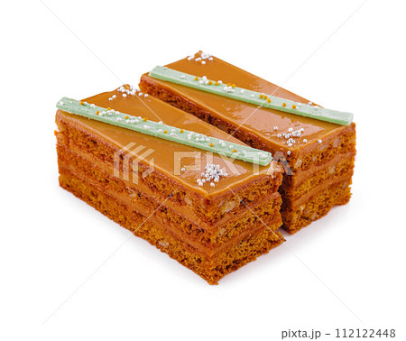 two slices walnut toffee cake on white two slices walnut toffee cake on white 112122448