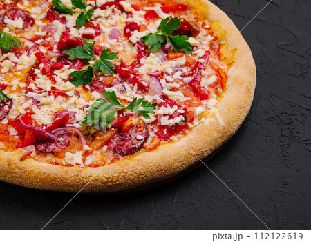 Italian pizza on black stone 112122619