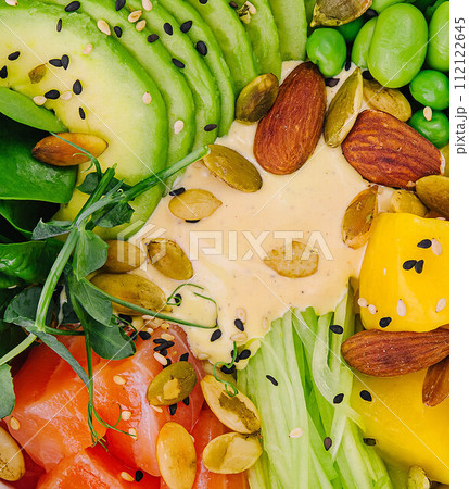 Hawaiian Poke Bowl with Salmon, Avocado and Cucumber Hawaiian Poke Bowl with Salmon, Avocado and Cucumber 112122645