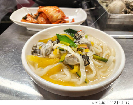 Korean seafood noodles soup. kalguksu (handmade) chopped noodles 112123157