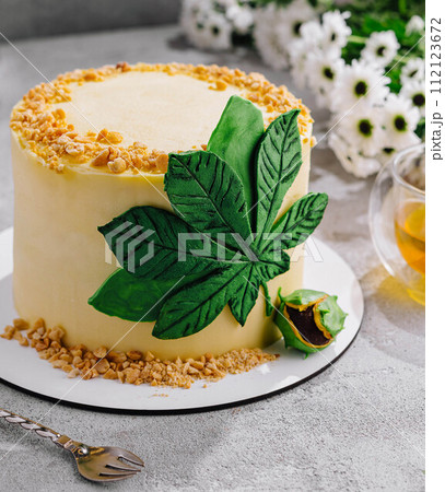 Peanut mousse Cake on white plate Peanut mousse Cake on white plate 112123672