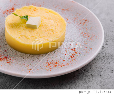 Mashed Potatoes with Butter on plate 112123833