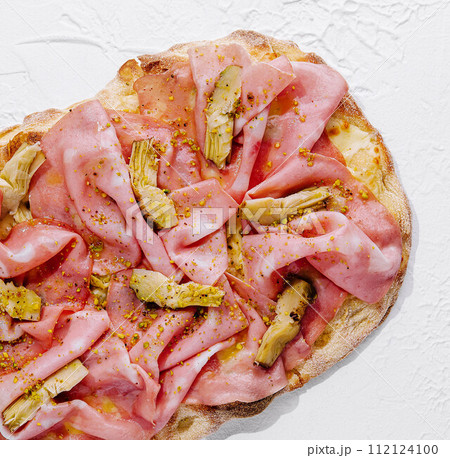 square pizza with ham and artichokes top view square pizza with ham and artichokes top view 112124100