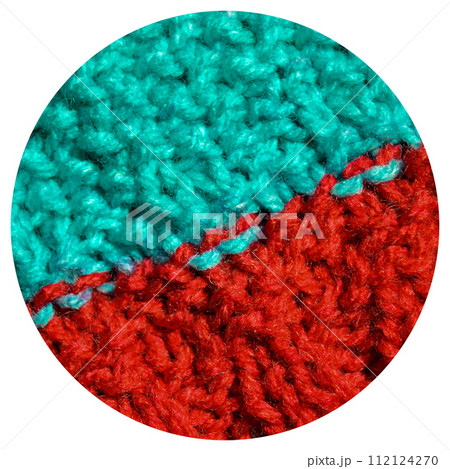 Handmade knitted fabric red and turquoise wool background texture 112124270