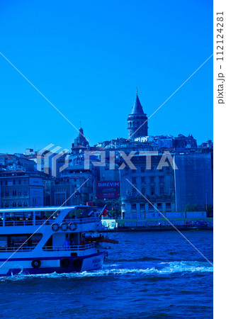 Galata Bridge and Galata Tower, one of the most visited places in Istanbul and small cruise ship, June 22 2019 Karakoy Istanbul Turkey 112124281