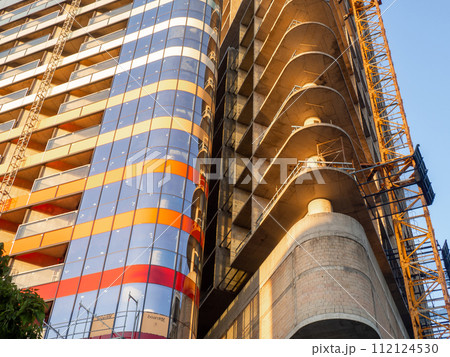 The frame of a high-rise building under construction. Reinforced concrete building. Construction industry. Skyscraper without cladding. 112124530