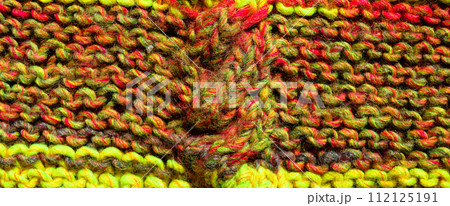 Handmade knitted fabric colored wool background texture Handmade knitted fabric colored wool background texture 112125191