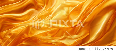 Many golden silk materials waft in the wind, intertwining with ample copy space. 112125479