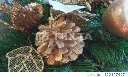 Christmas decorations on the fir tree. Close-up 112127497