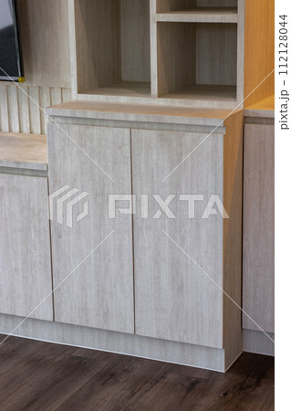 Internal details of the oak wooden cabinet. Detail of modern furniture. Internal details of the oak wooden cabinet. Detail of modern furniture. 112128044