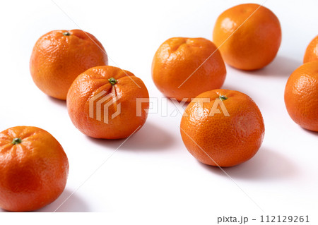 Fresh tangerines isolated on white background Fresh tangerines isolated on white background 112129261