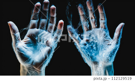 Human hands created from water on a black background. 112129519