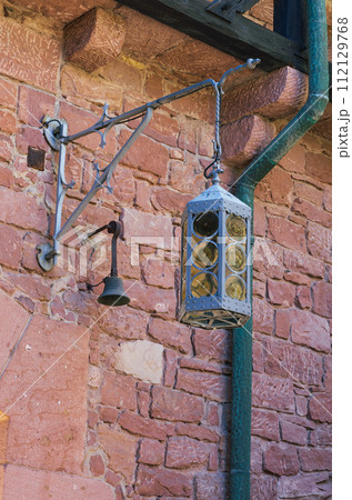 vintage lantern on the background of a brick wall alsace 112129768