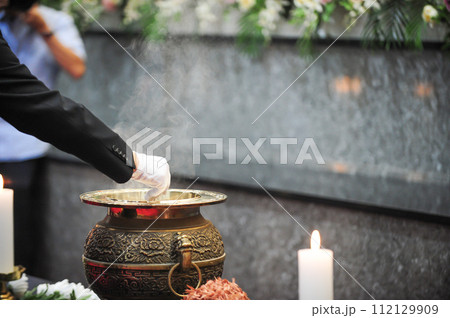 Incense burning in an incense burner 112129909