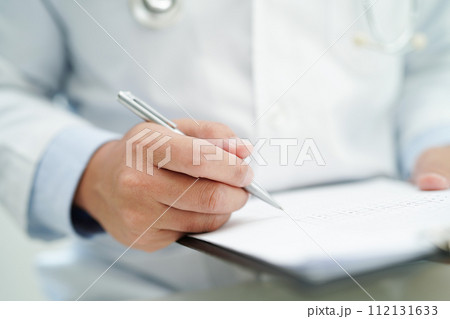Asian man doctor study document to research method and technic for treating patients. 112131633