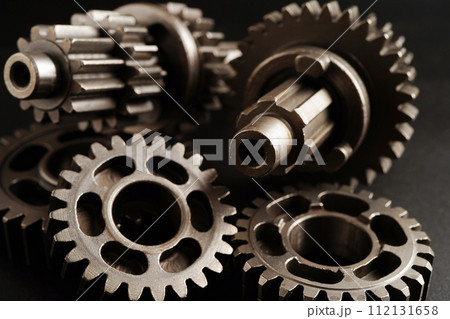 Metal gear wheel engine car and bike, mechanic industry concept. Metal gear wheel engine car and bike, mechanic industry concept. 112131658