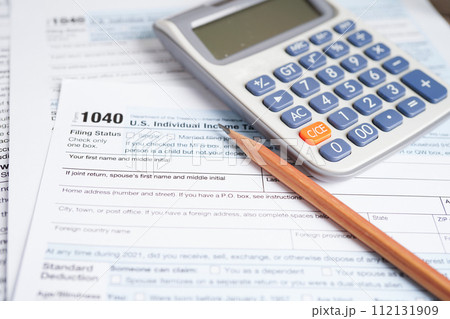 Tax form 1040 U.S. Individual Income Tax Return, business finance concept. 112131909
