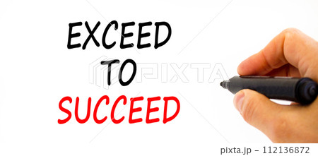 Exceed to succeed symbol. Concept words Exceed to succeed on beautiful white paper. Beautiful white table white background. Businessman hand. Business and exceed to succeed concept. Copy space. 112136872