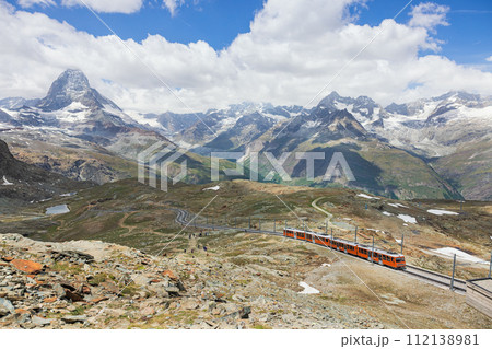 train on the background of the Matterhorn mountain in the Swiss Alps 112138981