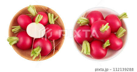 Radish in wooden bowl isolated on white background. Top view. Flat lay 112139288