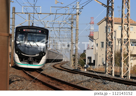 東武日光線を走る南栗橋行きの東急電鉄の車両 112143152
