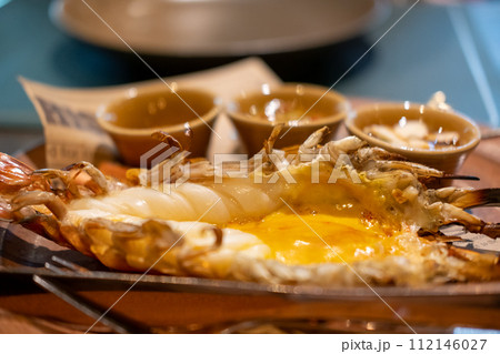 Grilled Shrimp served on Plate 112146027