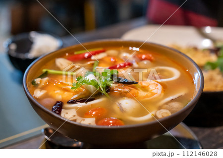 Tom yum, Thai Seafood spicy soup in bowl. 112146028