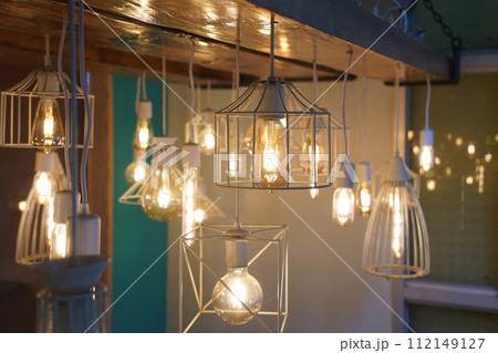 Antique style light bulbs hanging from the ceiling Antique style light bulbs hanging from the ceiling 112149127