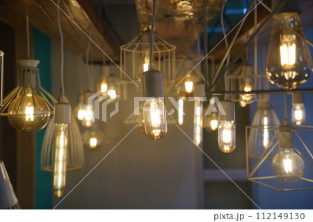 Antique style light bulbs hanging from the ceiling Antique style light bulbs hanging from the ceiling 112149130