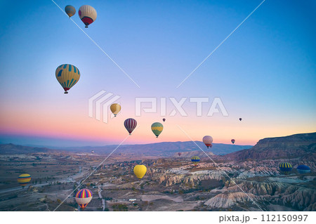 Flying hot air balloons 112150997