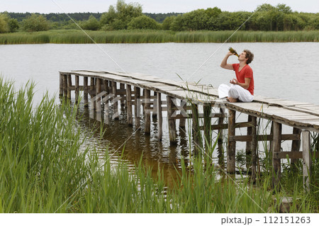 Man meditation with beer 112151263
