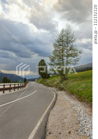 road in dolomite alps italy 112152120