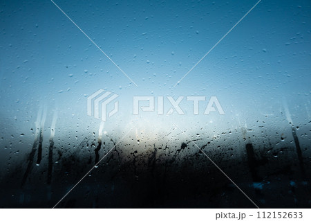 Window Rain, raindrops creating a beautiful, textured surface on a clear window texture background Window Rain, raindrops creating a beautiful, textured surface on a clear window texture background 112152633