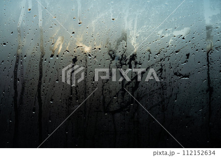 Window Rain, raindrops creating a beautiful, textured surface on a clear window texture background 112152634