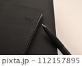 ビジネス手帳とボールペン 112157895