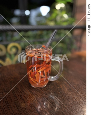 A glass of Wedang Uwuh from Indonesia A glass of Wedang Uwuh from Indonesia 112159569