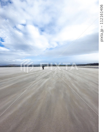 Sand storm at Dooey beach by Lettermacaward in County Donegal - Ireland Sand storm at Dooey beach by Lettermacaward in County Donegal - Ireland 112161406