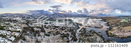 Aerial view of a snow covered Ardara in County Donegal - Ireland 112161409
