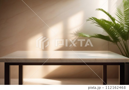 Empty blank marble tabletop on a beige wall, beautiful floral tropical shadow. Minimalistic backdrop for product presentation, podium, pedestal. Showcase, display case. Minimal abstract background. 112162468