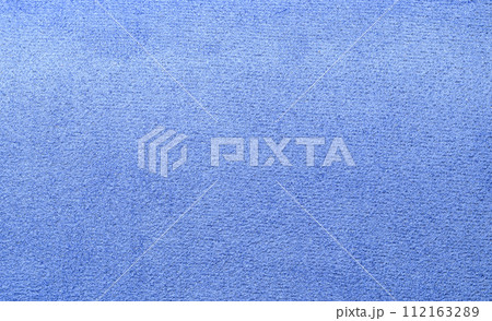 close-up texture of soft blue synthetics fabric cloth textile. close-up texture of soft blue synthetics fabric cloth textile. 112163289