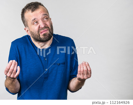 Man showing no money gesture Man showing no money gesture 112164926