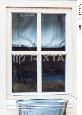 Detailed closeup of old white window 112166325