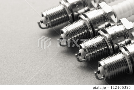 Auto service. Set of spark plugs as spare part of car. 112166356