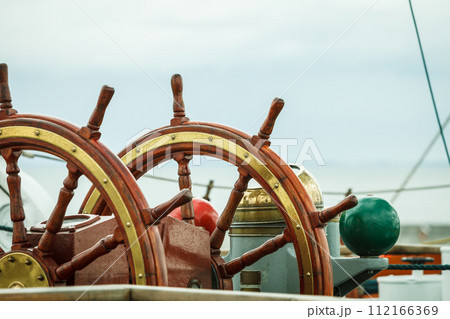 Closeup of helm rudder on ship or yacht Closeup of helm rudder on ship or yacht 112166369